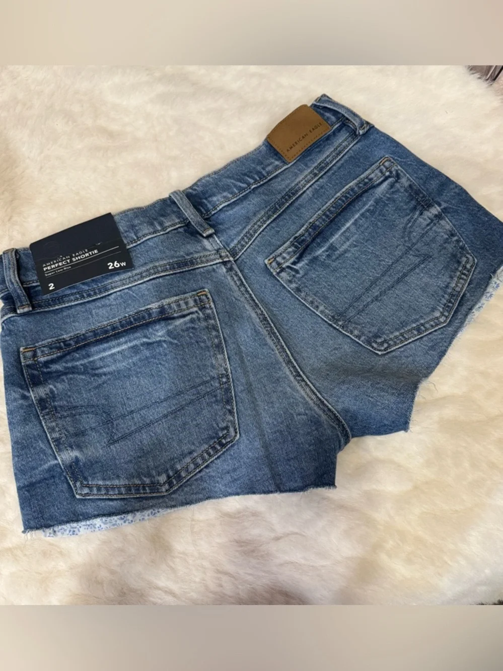 American Eagle AE Stretch Super Low-Rise Denim Perfect Shortie 
Medium Indigo - Picture 3 of 7